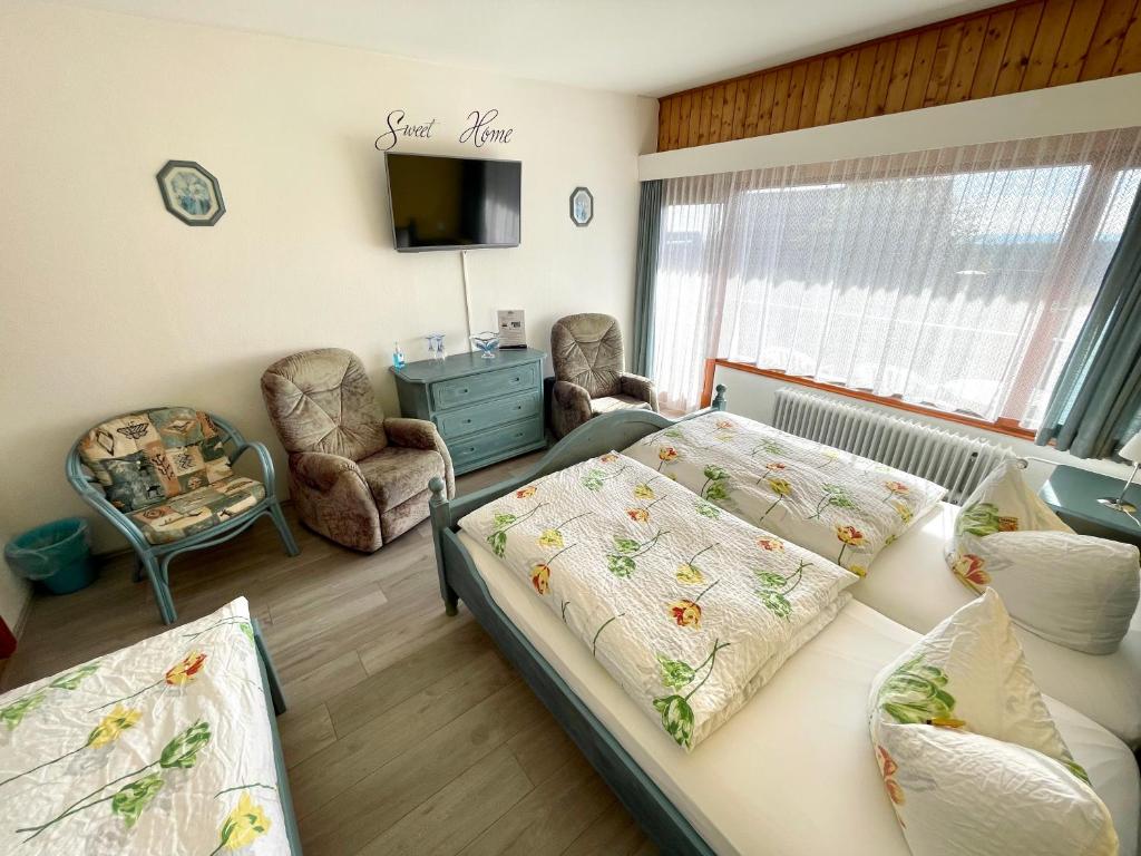 Postel nebo postele na pokoji v ubytování Hotel Charlott