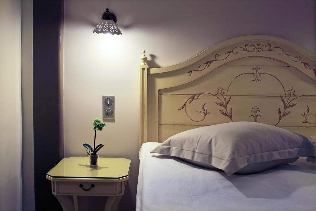 Postel nebo postele na pokoji v ubytování Hotel Doltso