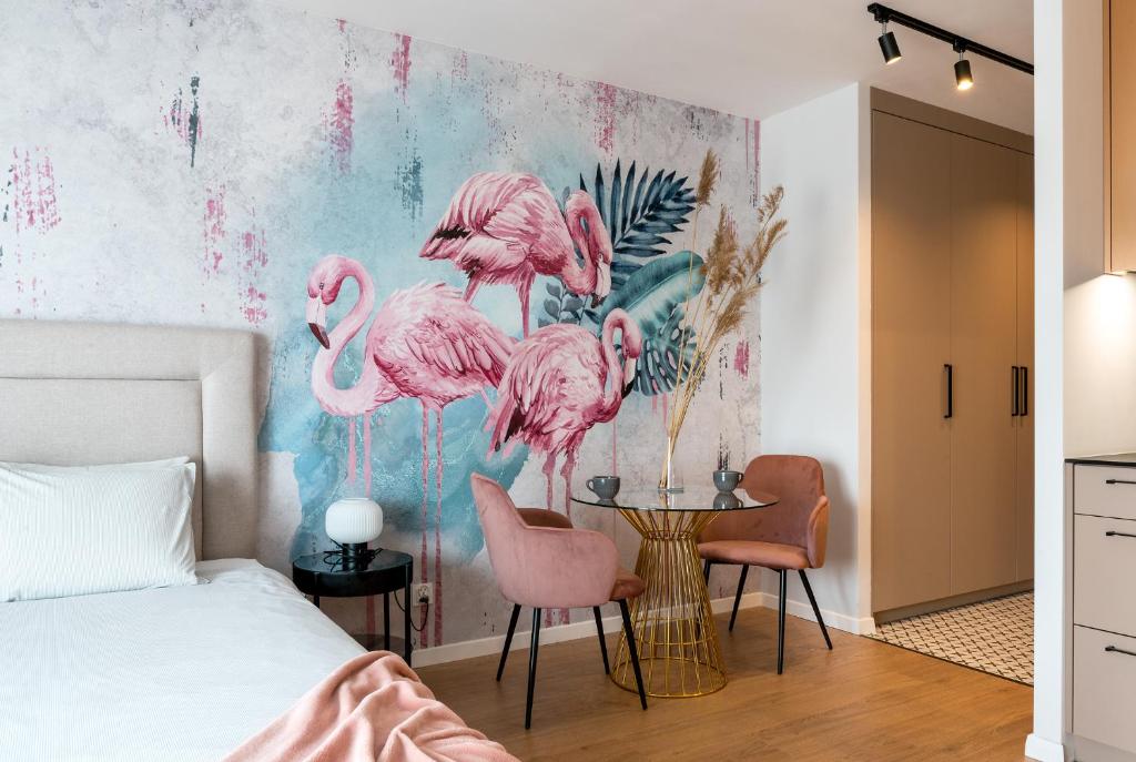 Łóżko lub łóżka w pokoju w obiekcie apartamenty-wroc Kurkowa