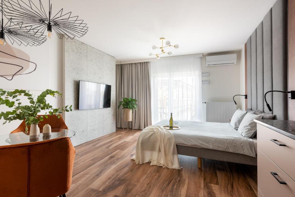 Łóżko lub łóżka w pokoju w obiekcie apartamenty-wroc Kurkowa
