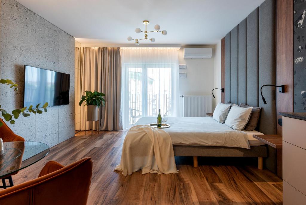 Łóżko lub łóżka w pokoju w obiekcie apartamenty-wroc Kurkowa