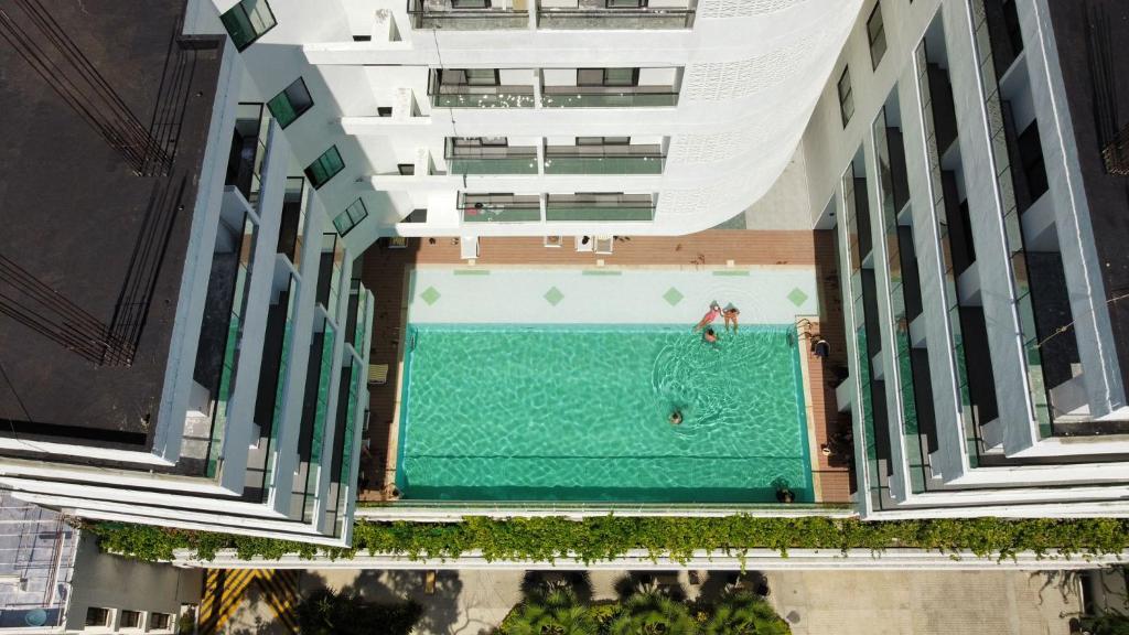 Vaade basseinile majutusasutuses 3H Hotel Rodadero SANTA MARTA või selle lähedal