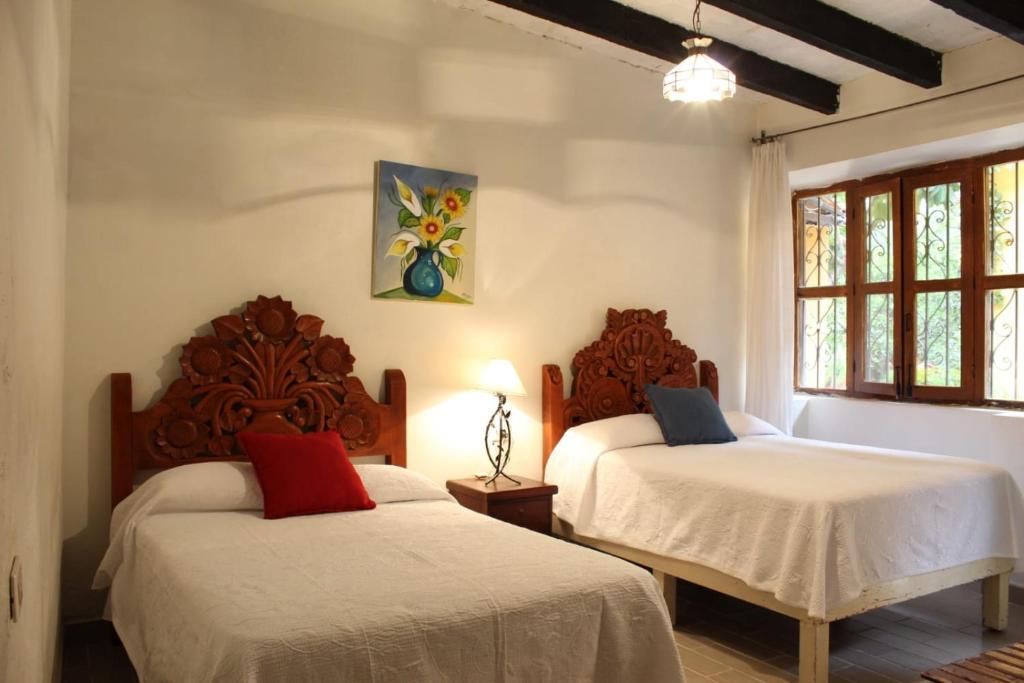 Postel nebo postele na pokoji v ubytování Hotel Sautto
