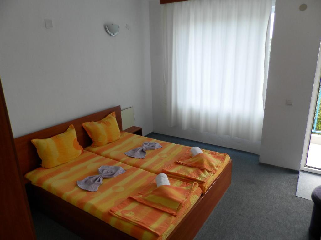 Postel nebo postele na pokoji v ubytování Hotel North