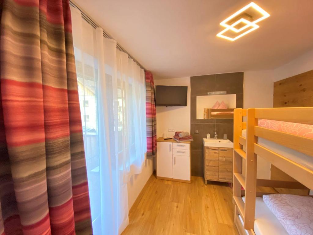 Posteľ alebo postele v izbe v ubytovaní Chalet Auszeit