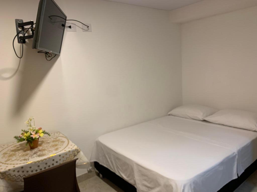 Voodi või voodid majutusasutuse Hostel Casa Zambrano toas