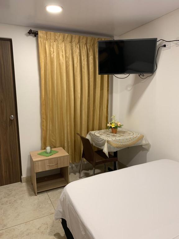 Voodi või voodid majutusasutuse Hostel Casa Zambrano toas