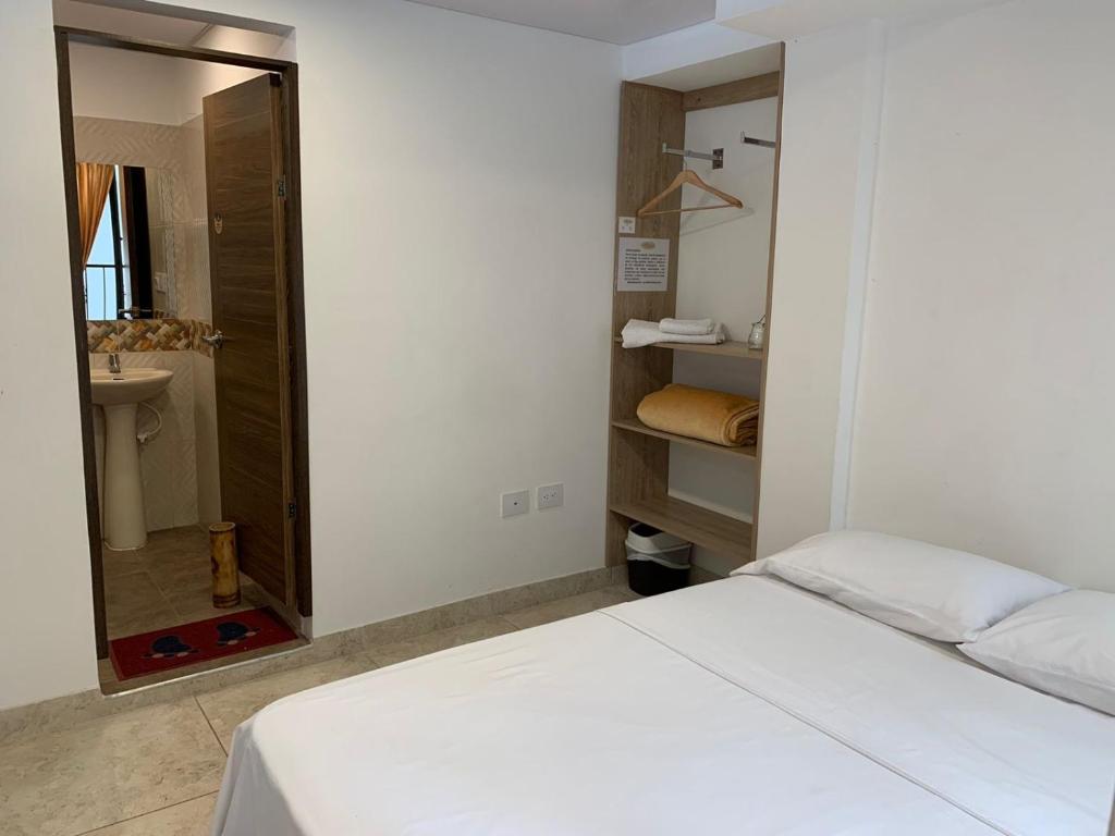 Voodi või voodid majutusasutuse Hostel Casa Zambrano toas