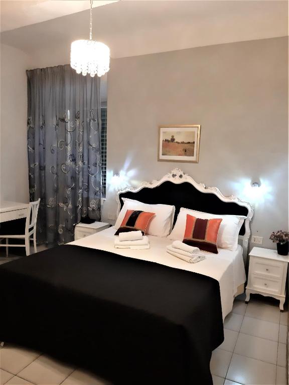 Postel nebo postele na pokoji v ubytování Hotel Victoria