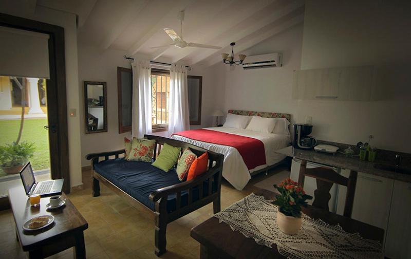 Postel nebo postele na pokoji v ubytování La Casona Hotel Boutique