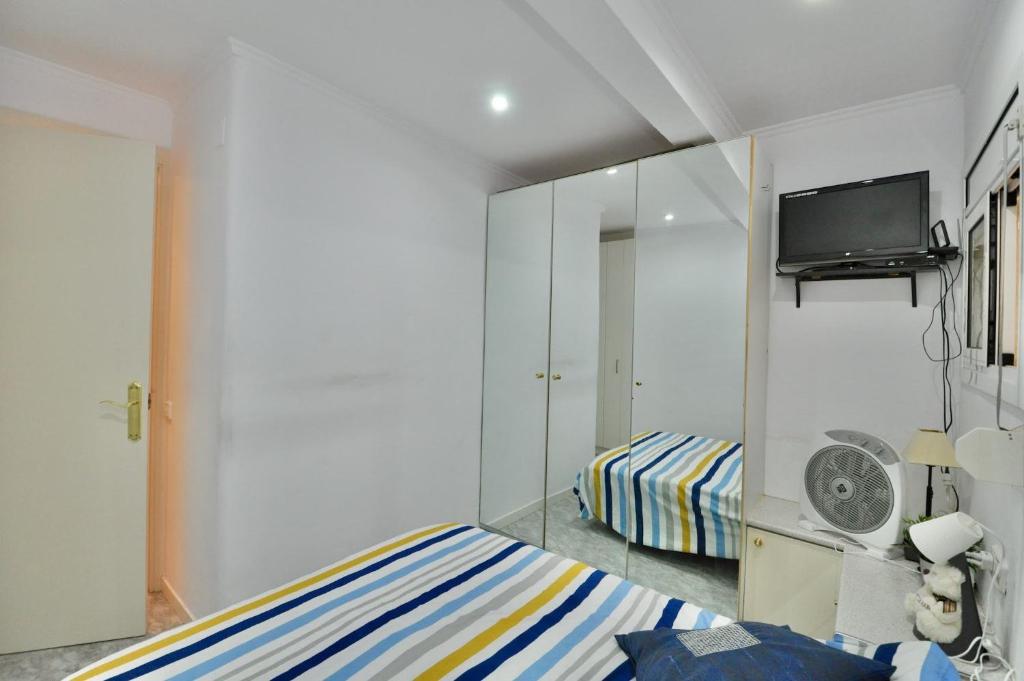 Posteľ alebo postele v izbe v ubytovaní Apartament Durall