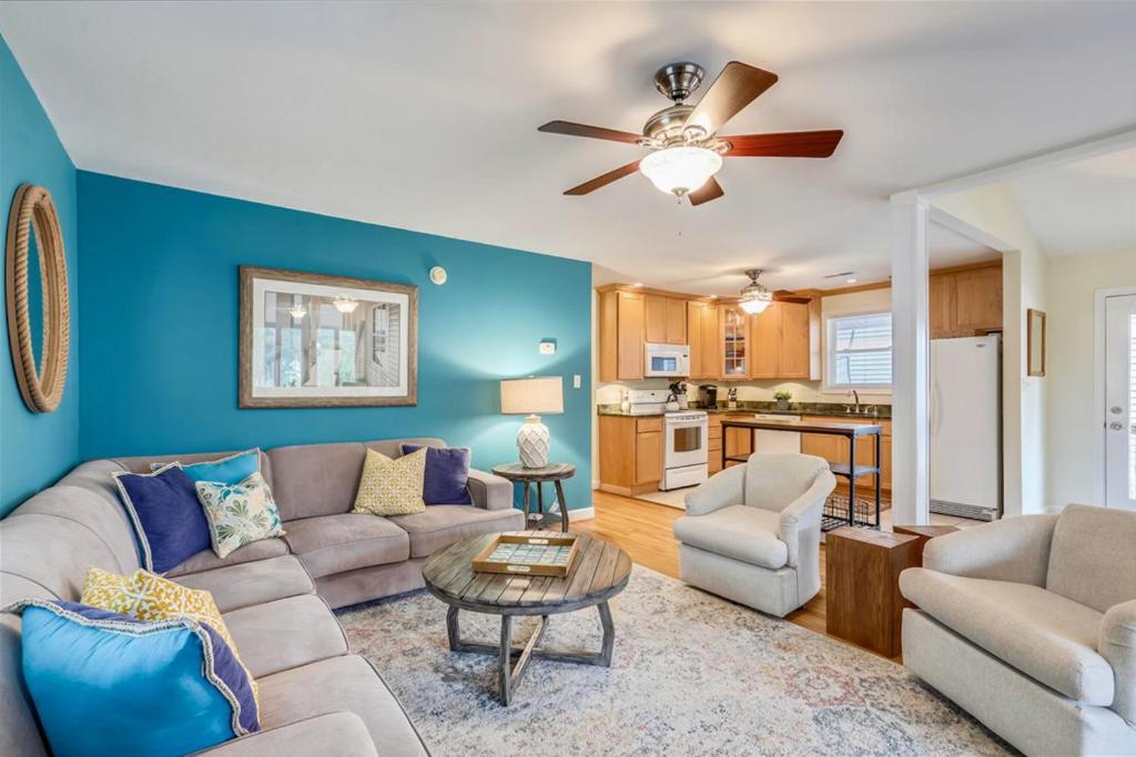 a living room with a couch and a table at Town of Bethany Beach -- 33282 Argyle in Bethany Beach