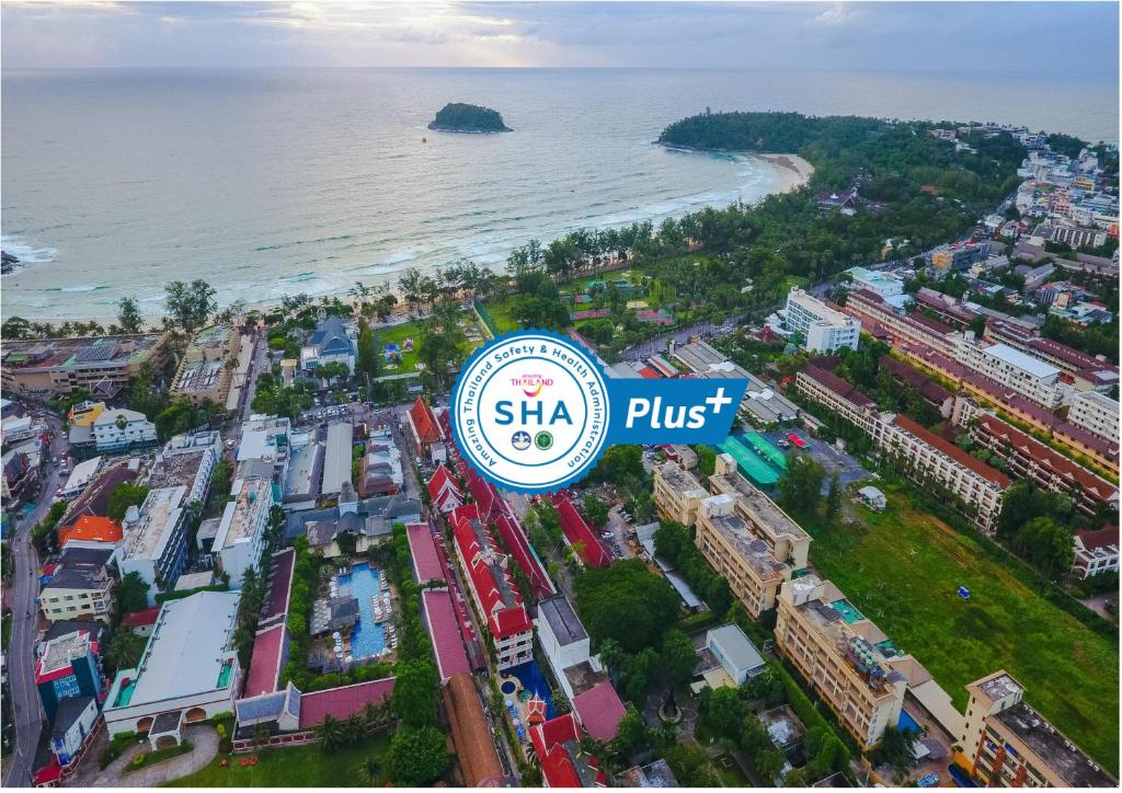 a city with a sign that reads shka plus at Kata Poolside Resort SHA Extra Plus in Kata Beach