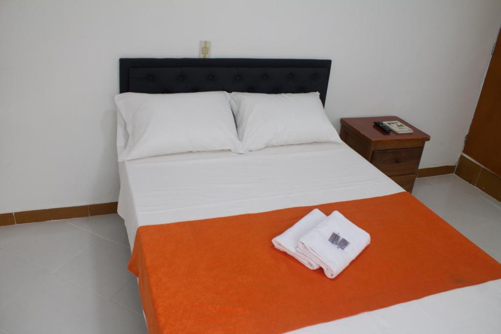 Postel nebo postele na pokoji v ubytování Hotel Picasso 70