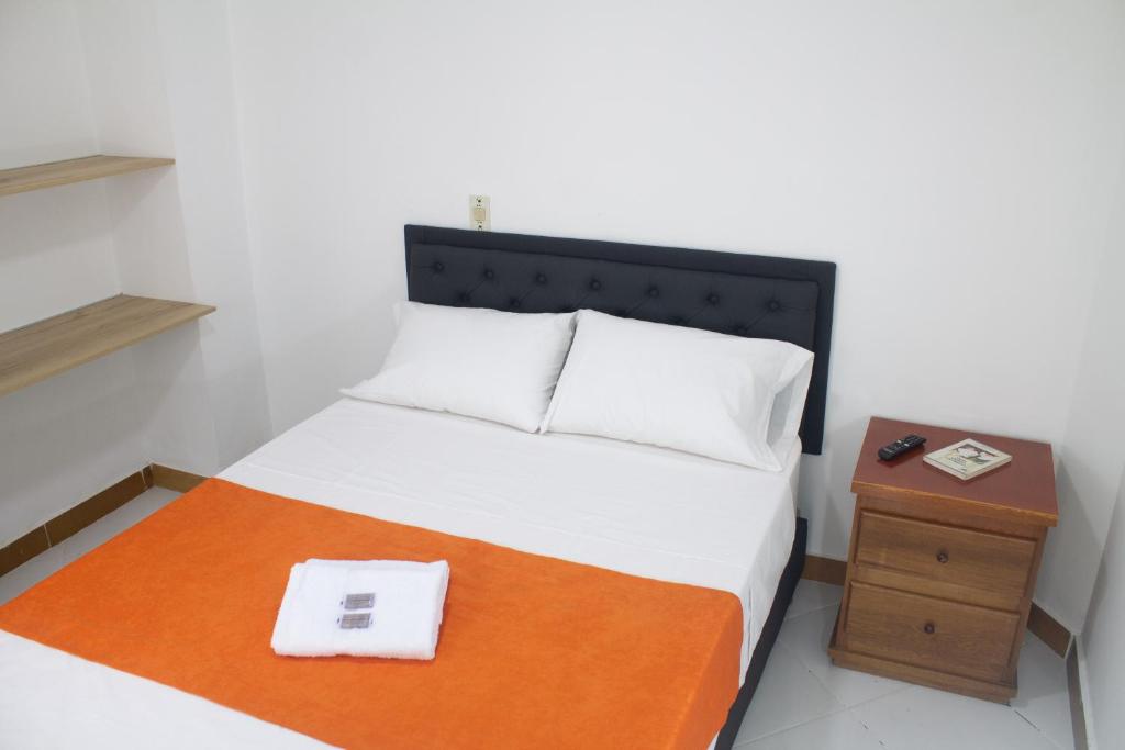 Postel nebo postele na pokoji v ubytování Hotel Picasso 70