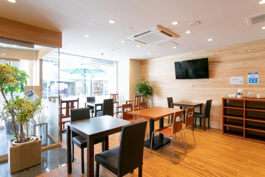 TV a/nebo společenská místnost v ubytování Bakery Hotel Chateau D'or