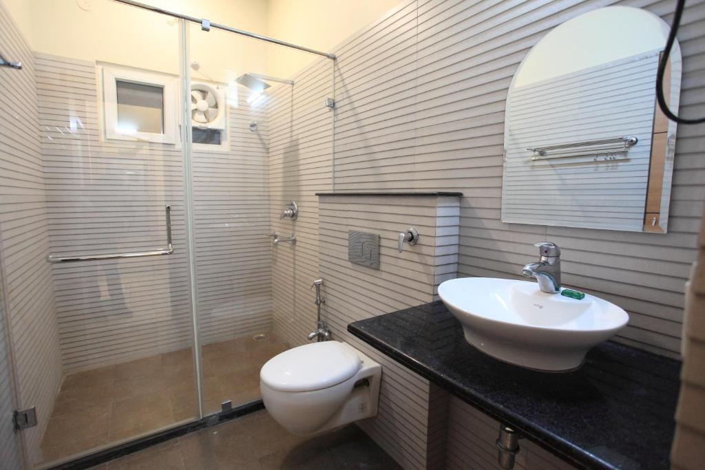 Koupelna v ubytování Hotel Anuvibha Malviya Nagar