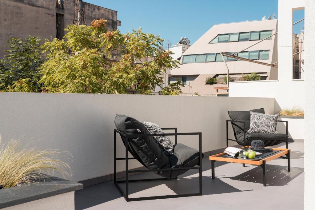 Posezení v ubytování 11 Enteka Acropolis Suites