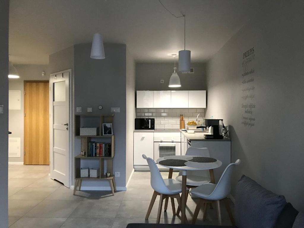 Kuchyňa alebo kuchynka v ubytovaní Holiday Hill Apartamenty Neli