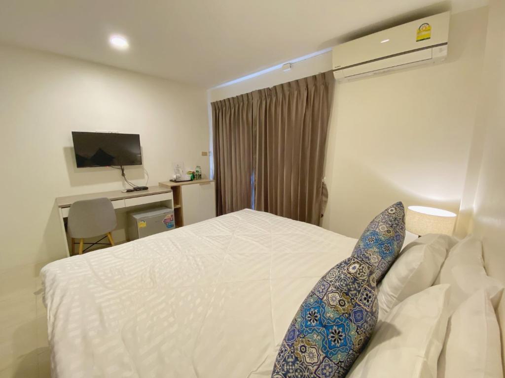 Postel nebo postele na pokoji v ubytování Mystays Phuket