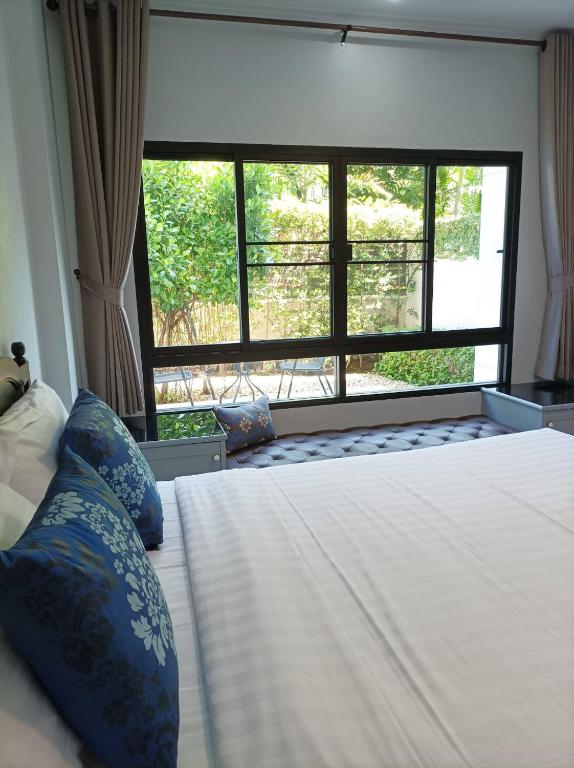 Postel nebo postele na pokoji v ubytování Double Tree Residence