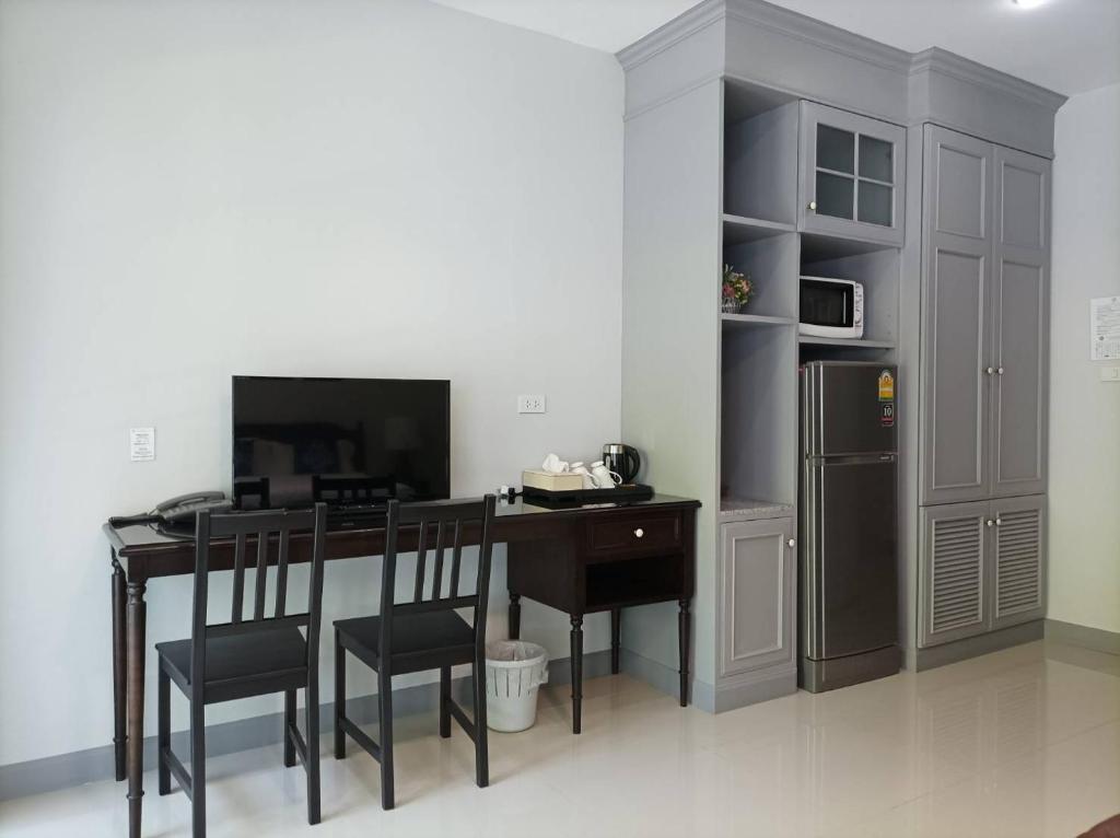 TV a/nebo společenská místnost v ubytování Double Tree Residence