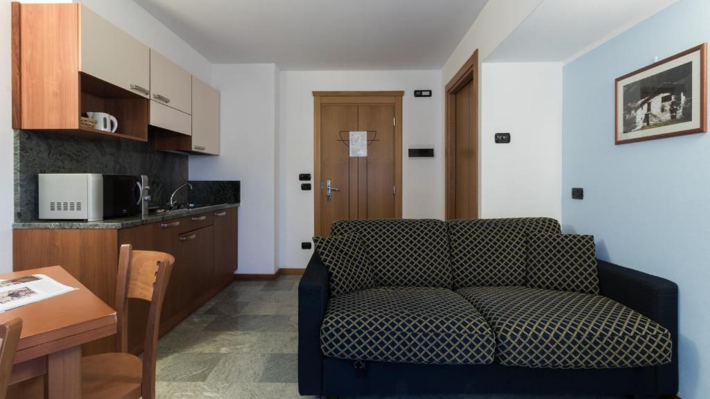 Kuchyň nebo kuchyňský kout v ubytování Residence Pizzo Scalino
