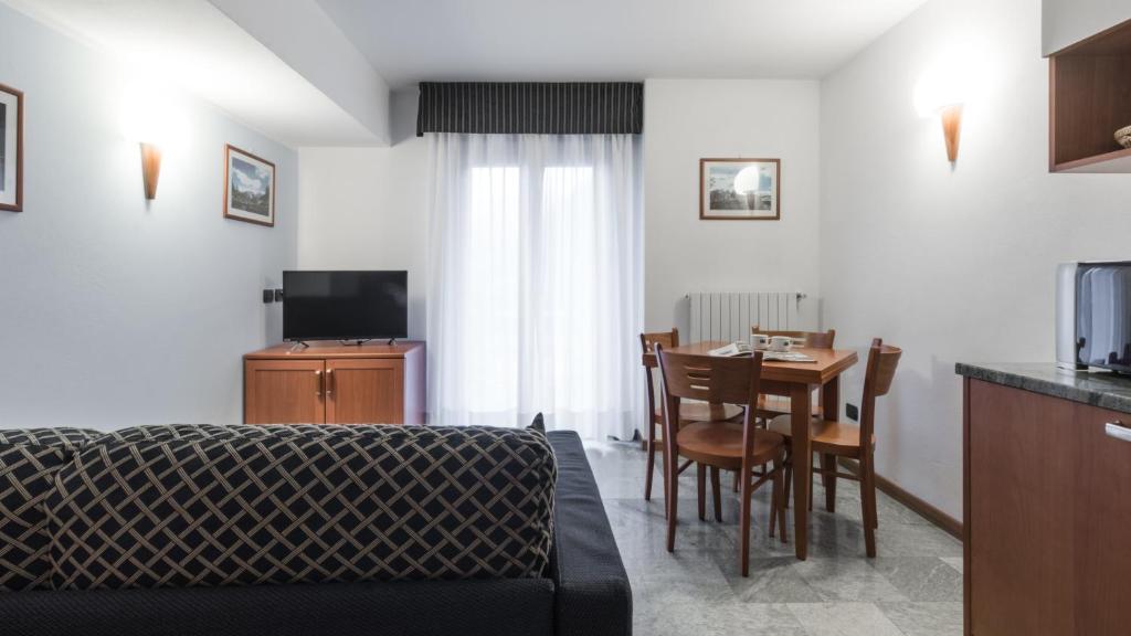 TV a/nebo společenská místnost v ubytování Residence Pizzo Scalino