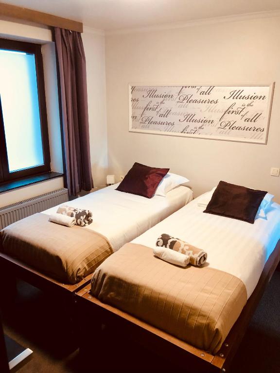 Postel nebo postele na pokoji v ubytování City Apartments by Malmedreams
