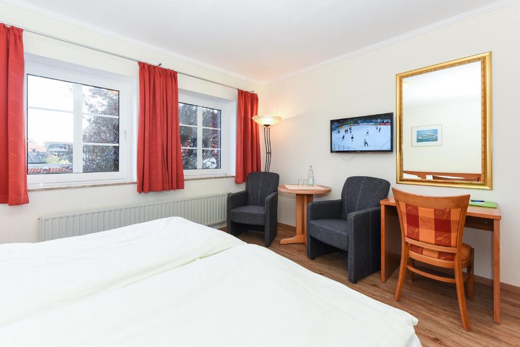Postel nebo postele na pokoji v ubytování Hotel Garni Benser Watt