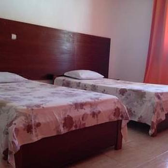 Postel nebo postele na pokoji v ubytování Residencial Laginha