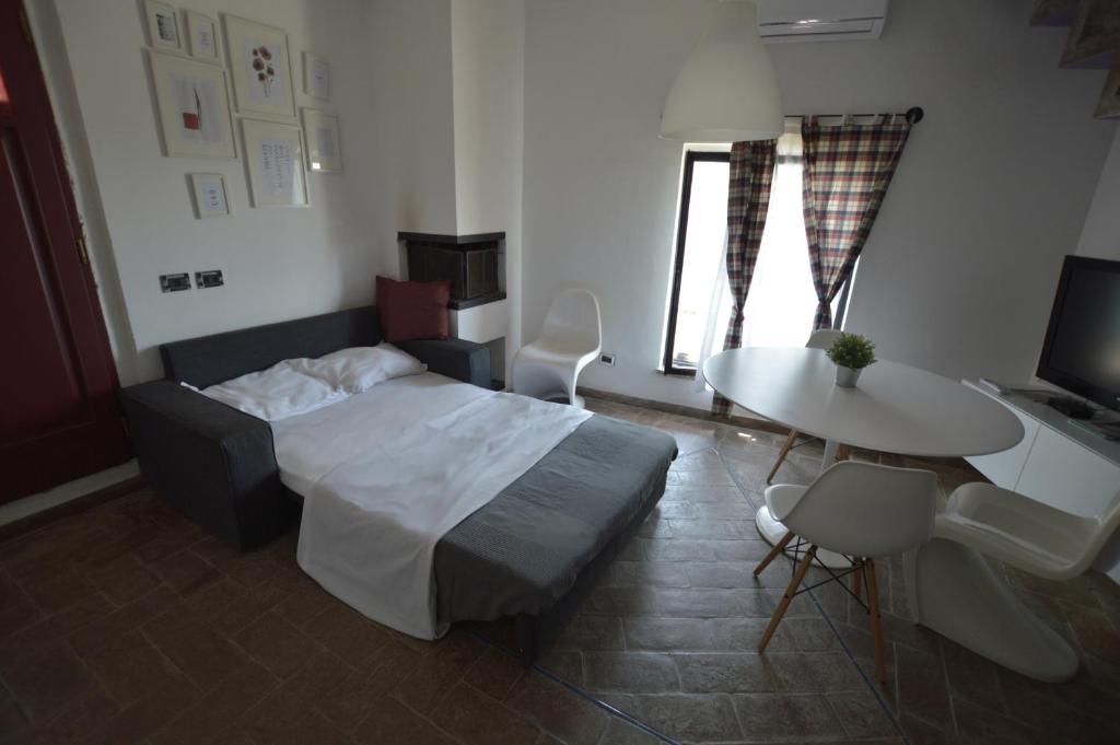 A bed or beds in a room at CASAILCAMBIO