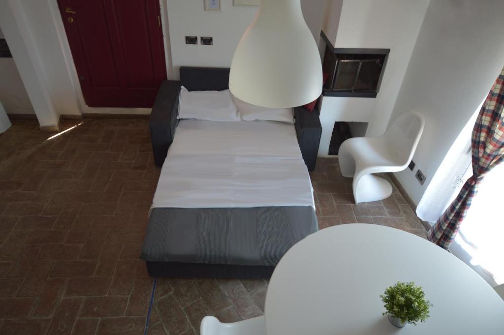A bed or beds in a room at CASAILCAMBIO