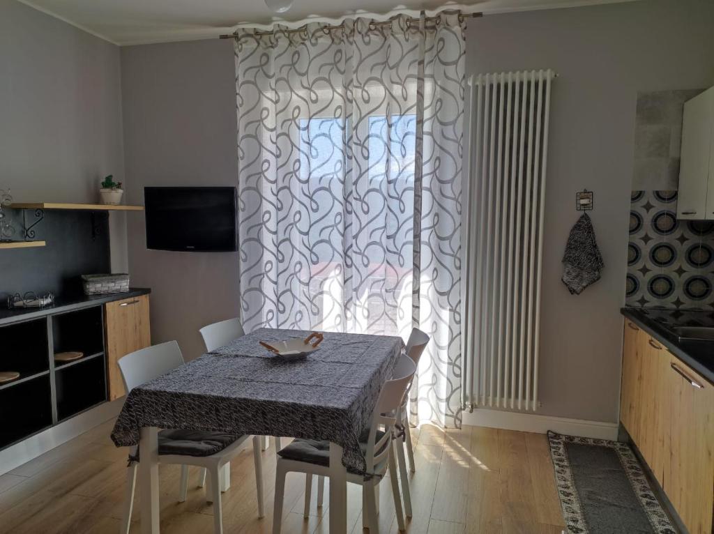 Kuchyň nebo kuchyňský kout v ubytování Porta d'Alpi