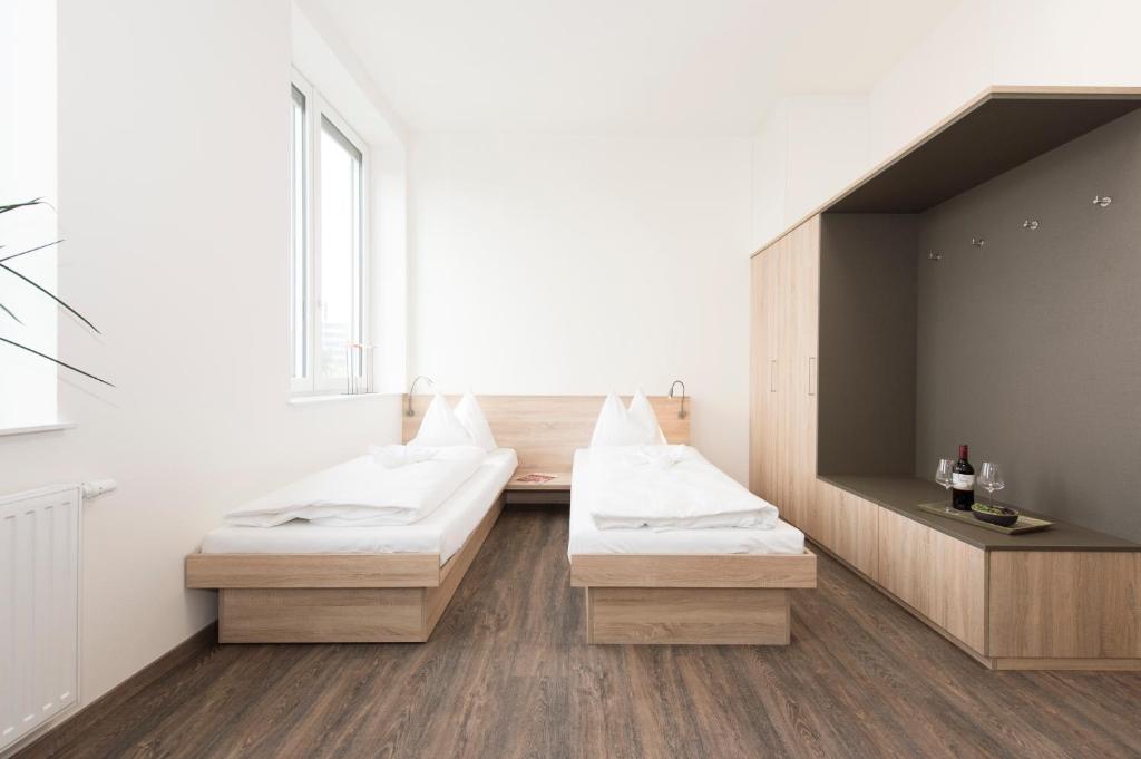 Voodi või voodid majutusasutuse TT-ROOMS - kontaktlos mit Self Check-in I FREE PARKING toas