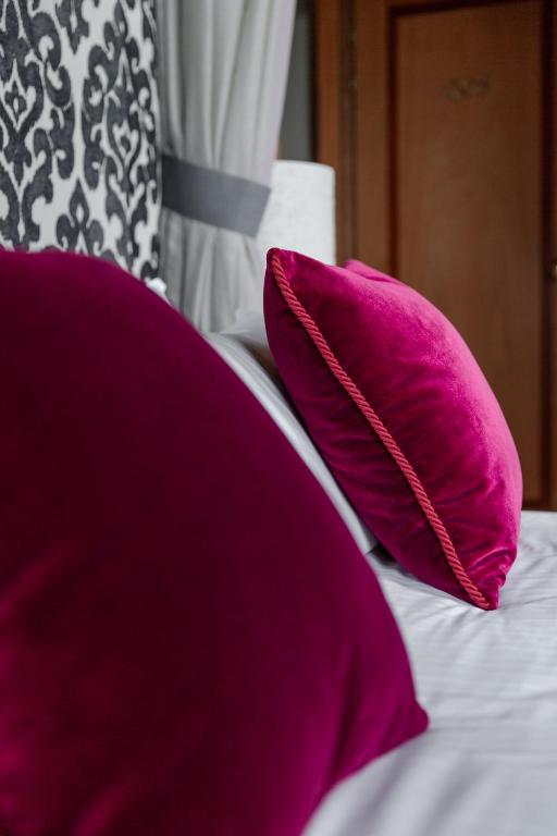 Postel nebo postele na pokoji v ubytování Boutique Hotel Municipio 1815