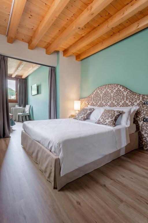Postel nebo postele na pokoji v ubytování Boutique Hotel Municipio 1815