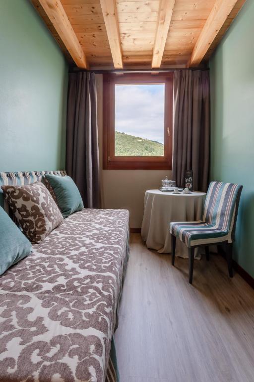 Postel nebo postele na pokoji v ubytování Boutique Hotel Municipio 1815