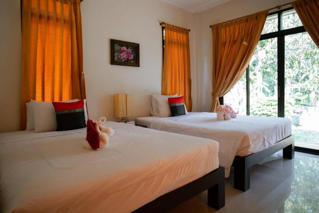 Baan Klong Resortにあるベッド