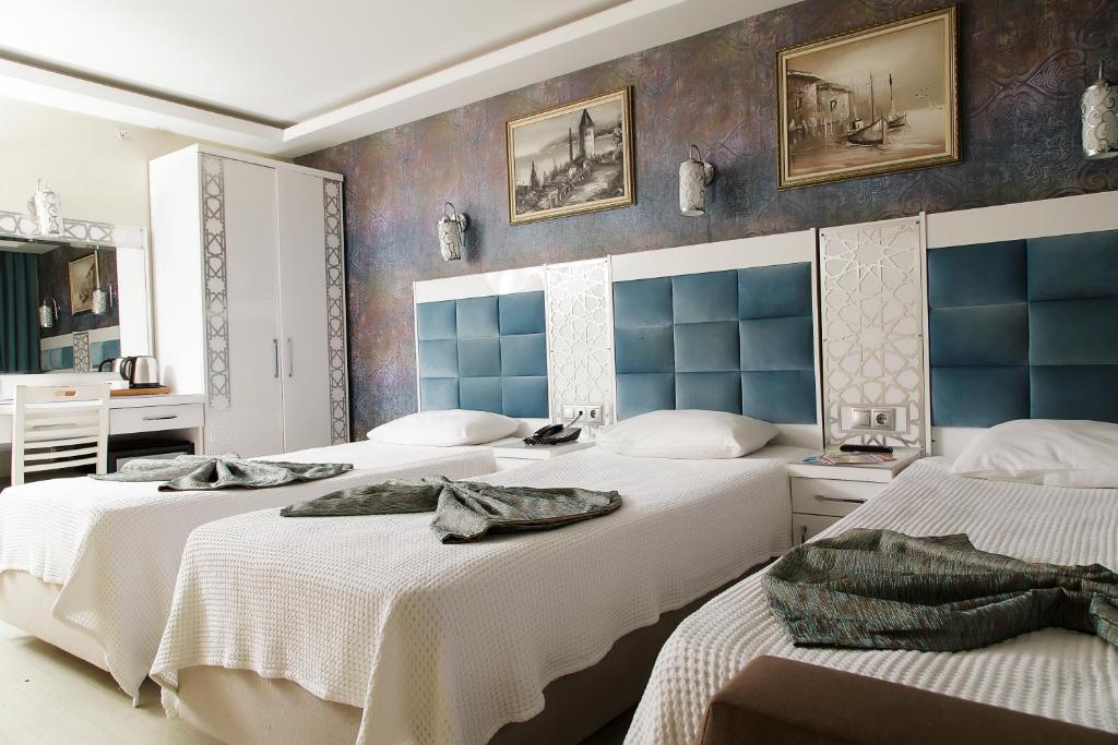 Кровать или кровати в номере Istanbul River Hotel