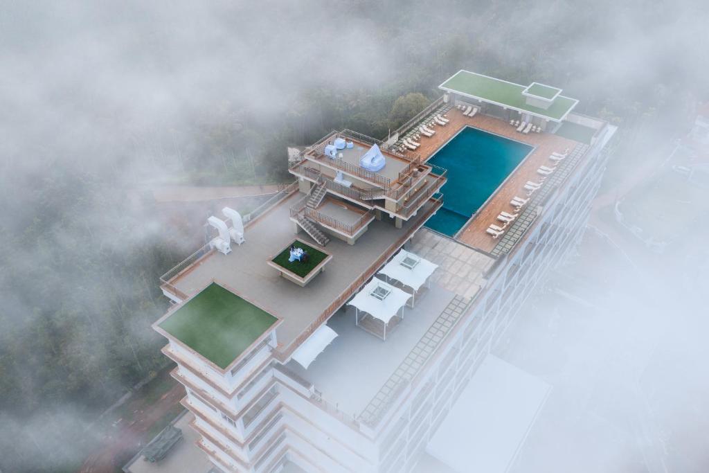 Bazén v ubytování Vibe Munnar Resort & Spa nebo v jeho okolí