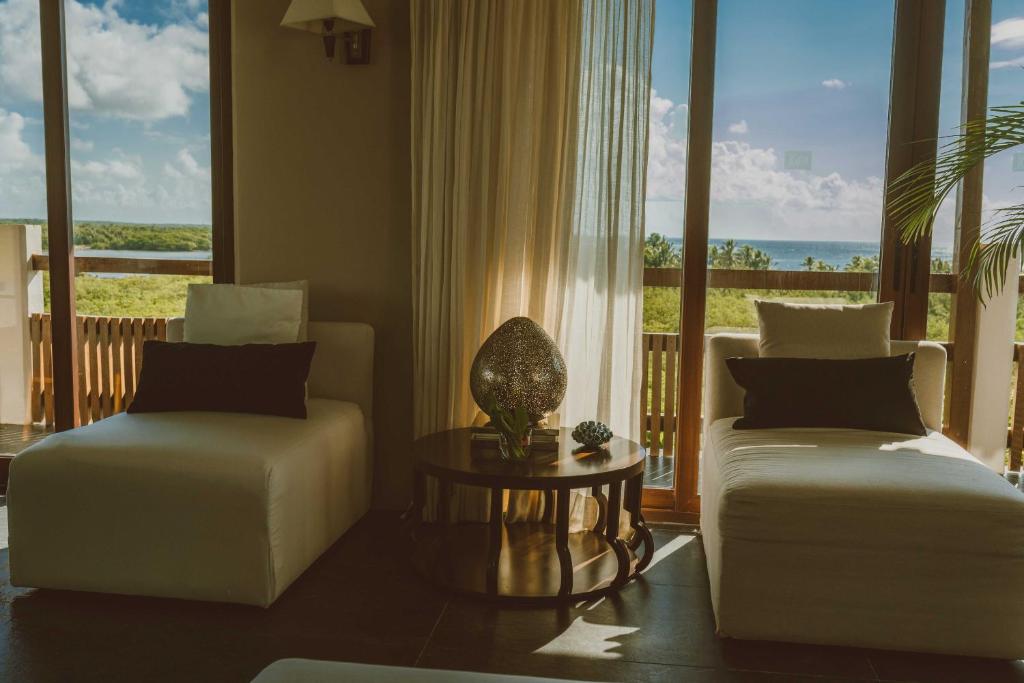 Postel nebo postele na pokoji v ubytování Jashita Hotel