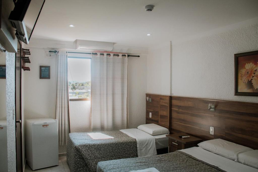 Postel nebo postele na pokoji v ubytování Hotel Masseilot