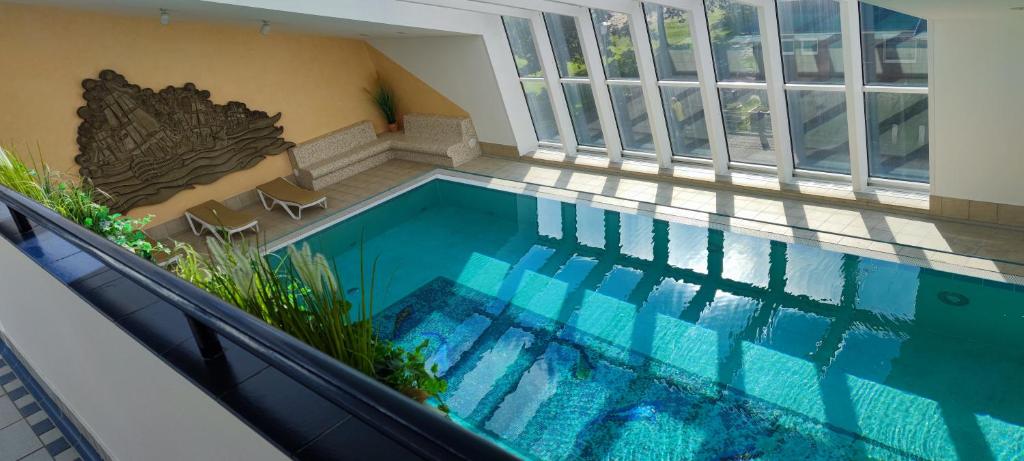 a swimming pool in the middle of a house at Trafalgar Apartment 133 in Cuxhaven