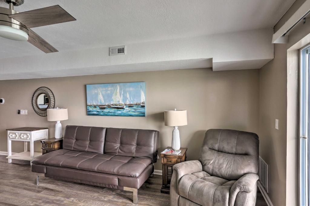 a living room with a couch and a chair at Middle Bass Condo with Balcony, Lake Erie Views in Put-in-Bay