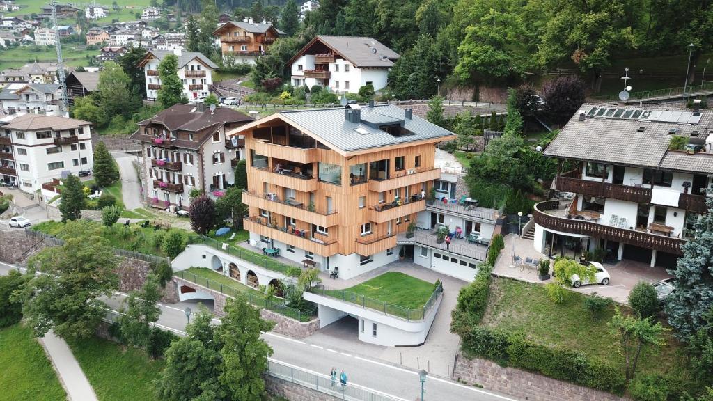 an overhead view of a large house in a city at Villa Hubertus in Ortisei