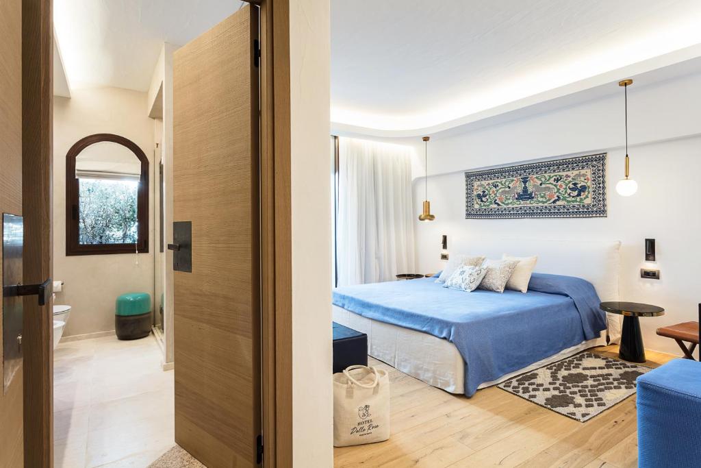 Postel nebo postele na pokoji v ubytování Hotel delle Rose a Luxury Boutique Hotel
