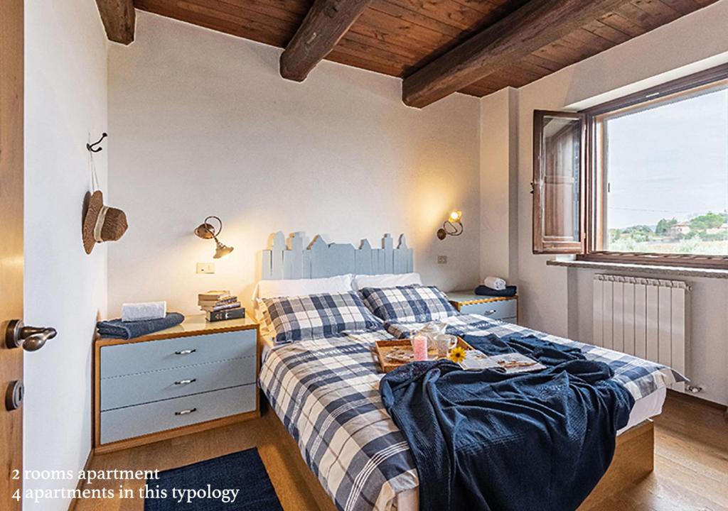 Postel nebo postele na pokoji v ubytování Borgo Solario