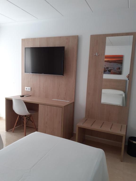 Postel nebo postele na pokoji v ubytování Hotel Iberflat Marynton