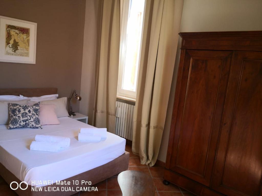 Postel nebo postele na pokoji v ubytování B&B Palazzo de "Il Nuovo Duca Minimo"